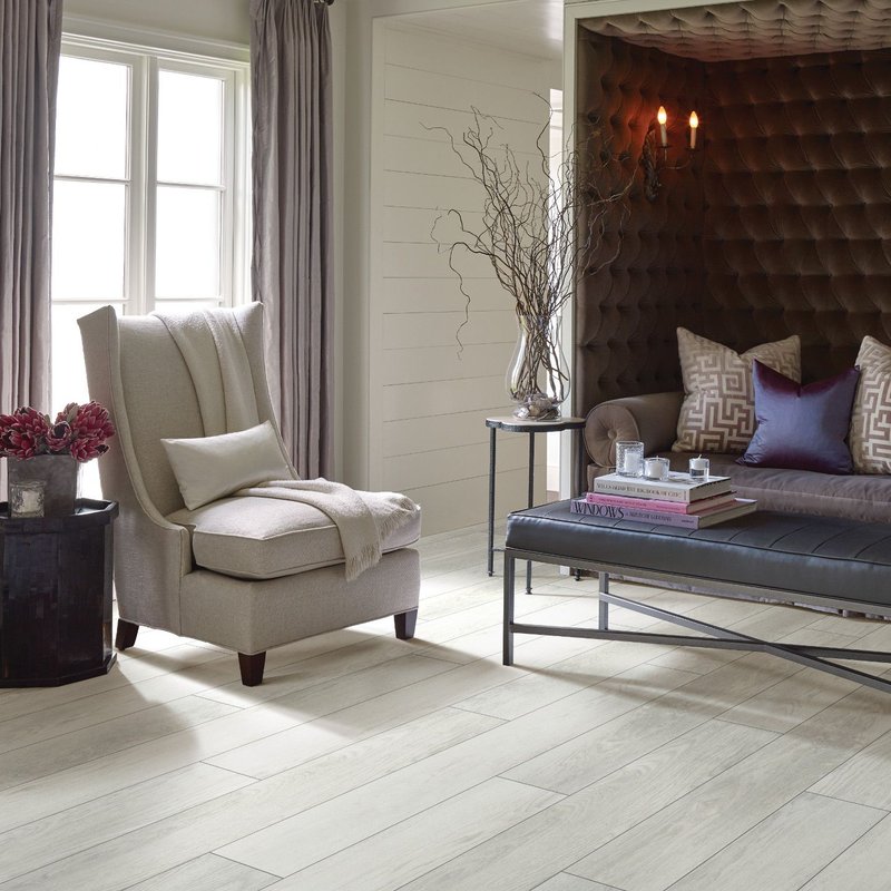 Elegant living room with wood-look luxury vinyl flooring from Brosious Carpet and Floors Inc in Missoula, MT