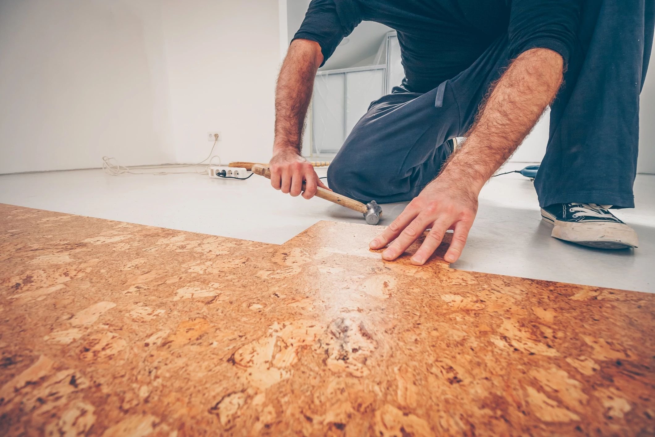 Person installing Cork flooring from Brosious Carpet and Floors Inc in Missoula, MT