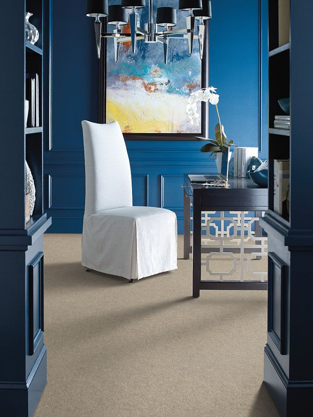 Home office with blue walls and a white chair from Brosious Carpet and Floors Inc in Missoula, MT