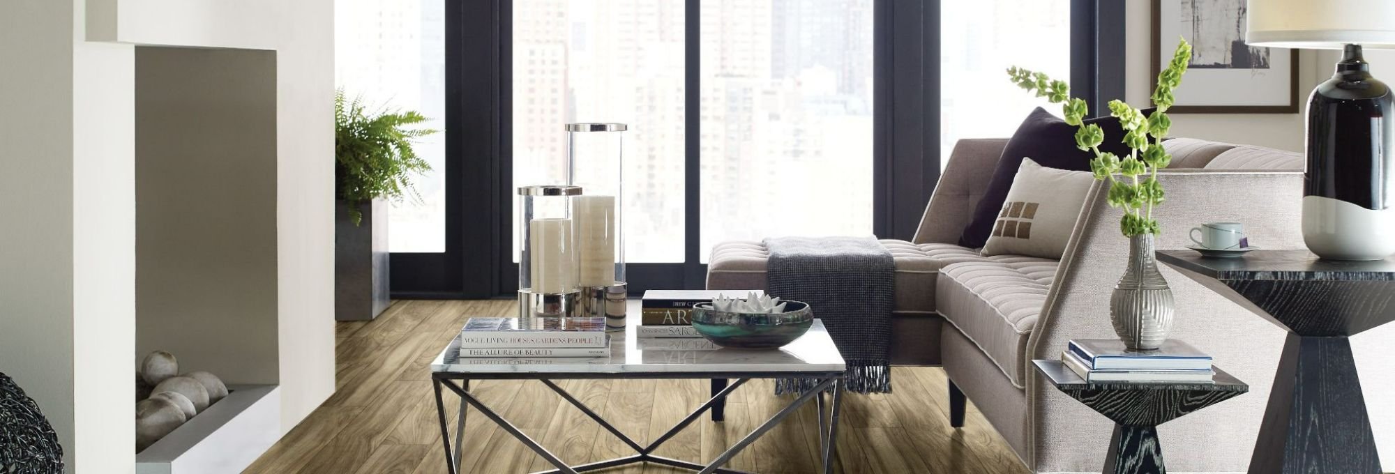 Living room with wood-look laminate flooring from Brosious Carpet and Floors Inc in Missoula, MT