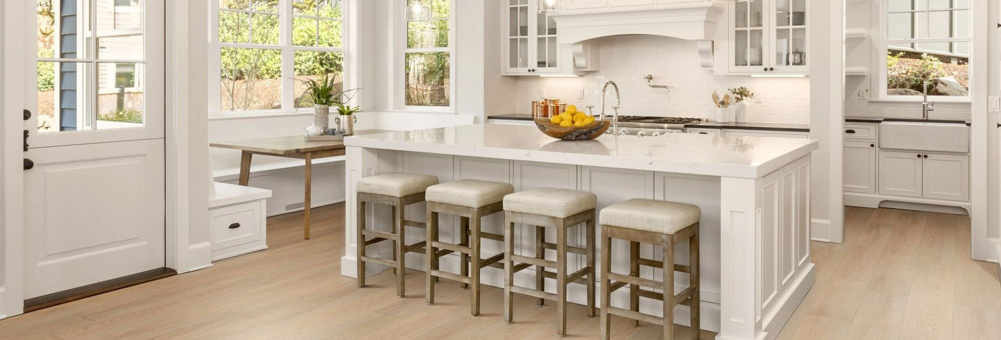 Kitchen with wood-look luxury vinyl flooring from Brosious Carpet and Floors Inc in Missoula, MT